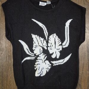 Black Sleeveless Sweater with White Floral Design